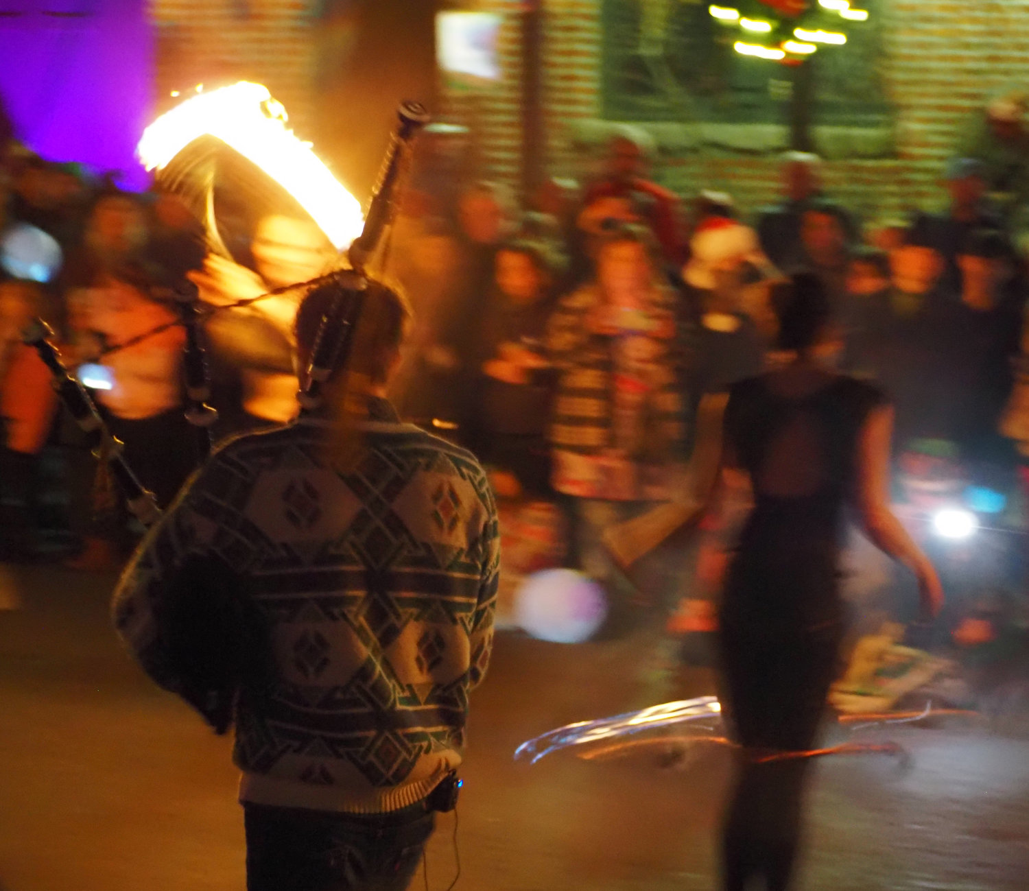 Elias Alexander joined the fire dancers with his bagpipes for one final number, weaving his way around the flames.